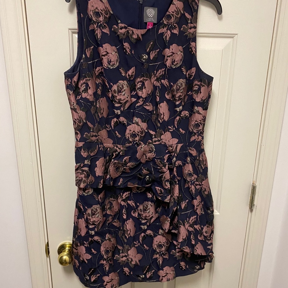 dress with front asymmetrical peplum
